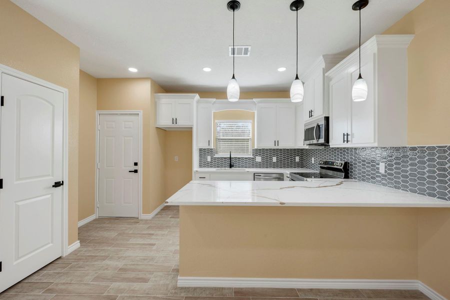 Furnished interior view inside a new home in , Bryan (Image 5). Furnished interior view inside a new home in , Bryan (Image 5).