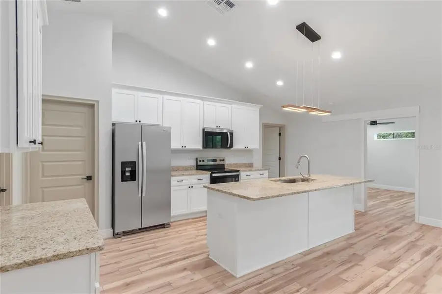 Furnished interior view inside a new home in , Ocala (Image 9).