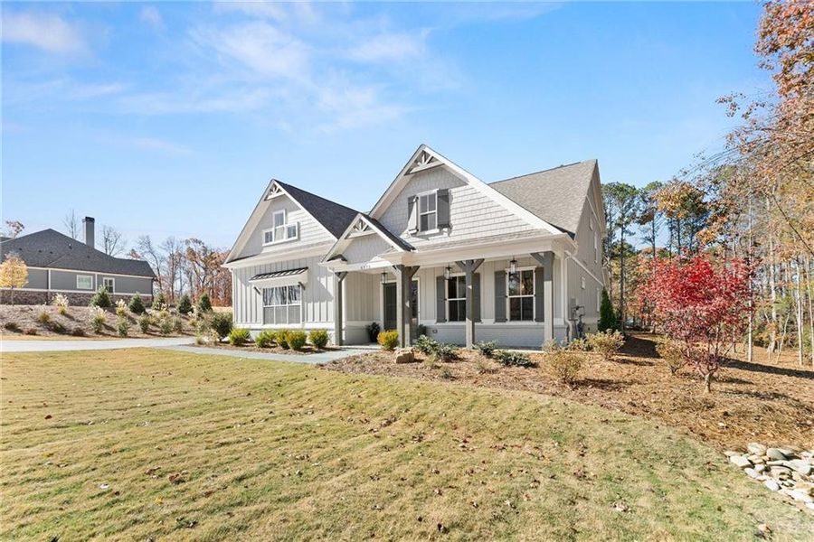 Front exterior of a new home in , Gainesville, GA, highlighting curb appeal (Image 31).