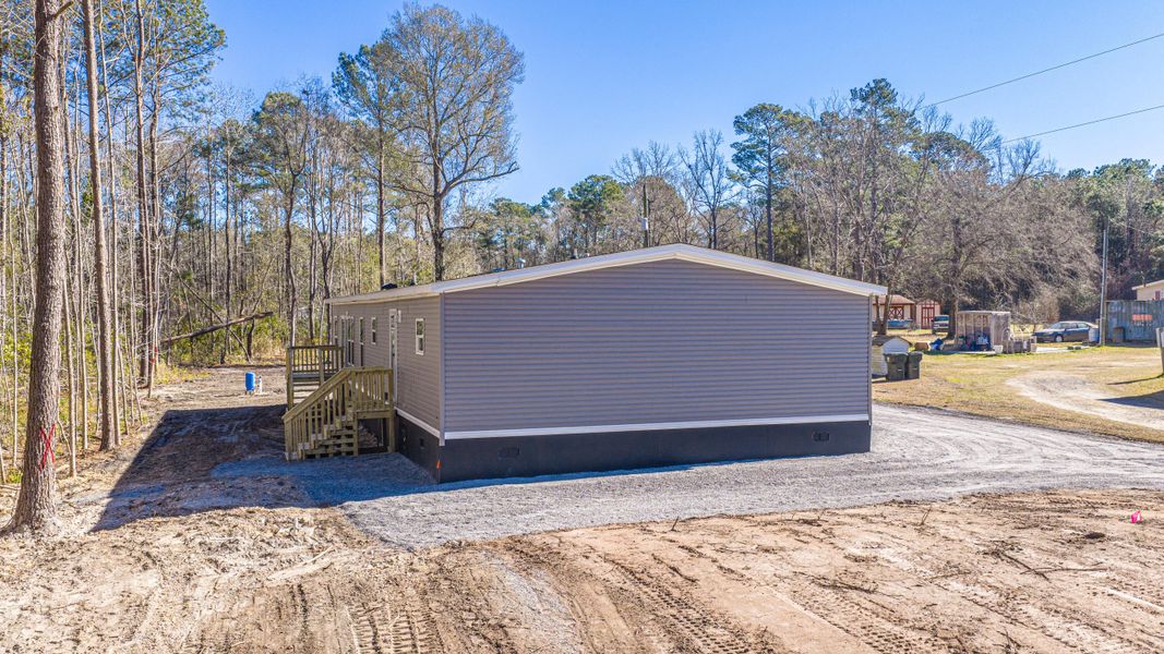 Exterior details and patio area of a home in , Summerville (Image 15).