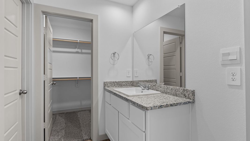 Representative furnished interior of a home built from the The Elgin by D.R. Horton in Allen Farms, Lubbock (Image 9).
