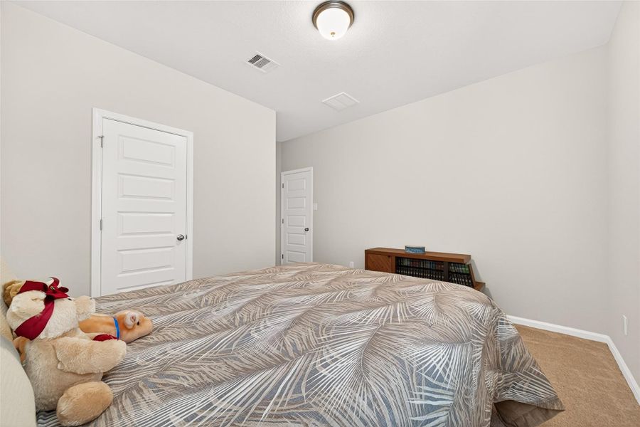 Furnished interior view inside a new home in Mill Creek Trails, Magnolia (Image 39).