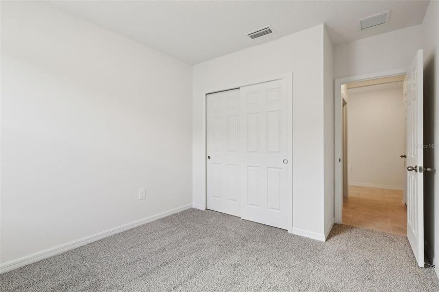 Spacious, unfurnished interior of a new home in Bradbury Creek - Signature Series, Haines City (Image 17).