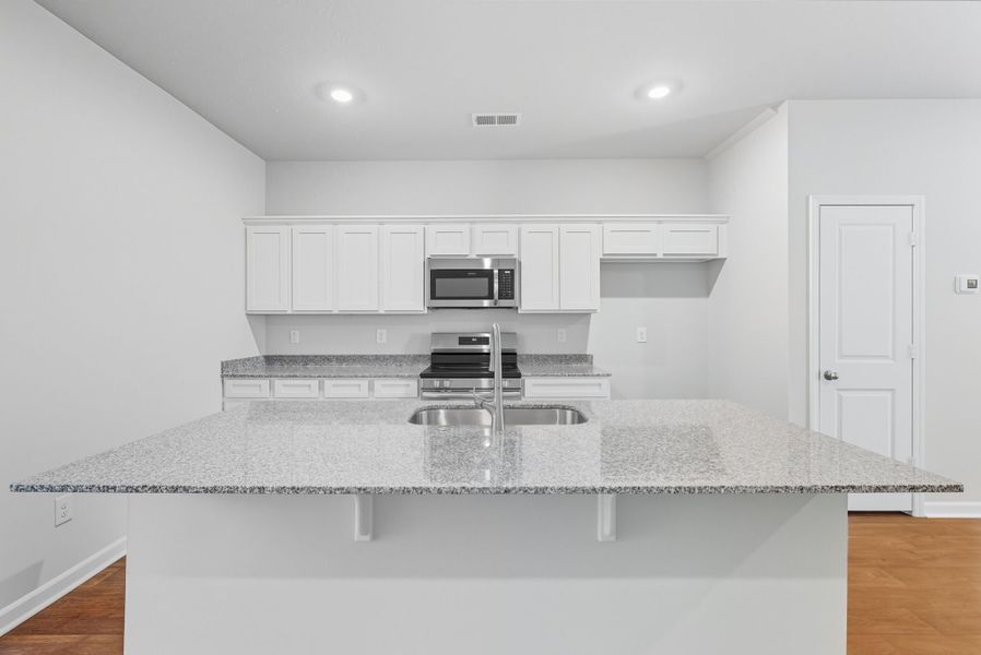 Representative furnished interior of a home built from the Palmetto II by McGuinn Homes in Clarke Townes, Anderson (Image 8).