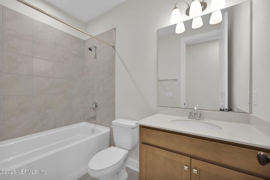 Furnished interior view inside a new home in Trailmark - Phase 10, St. Augustine (Image 9). Furnished interior view inside a new home in Trailmark - Phase 10, St. Augustine (Image 9).