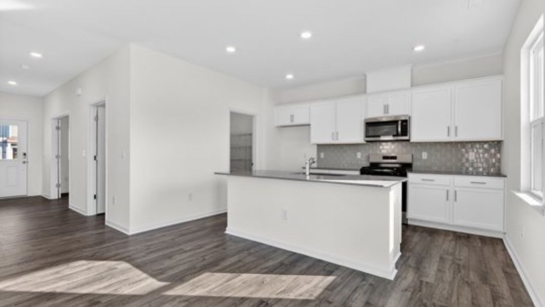 Furnished interior view inside a new home in The Reserve at Prestleigh, Wake Forest (Image 9).