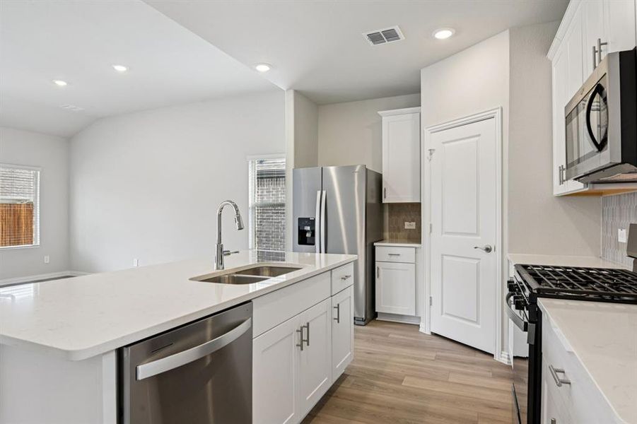 Furnished interior view inside a new home in Parks at Foster Crossing - Signature Series, Anna (Image 11).