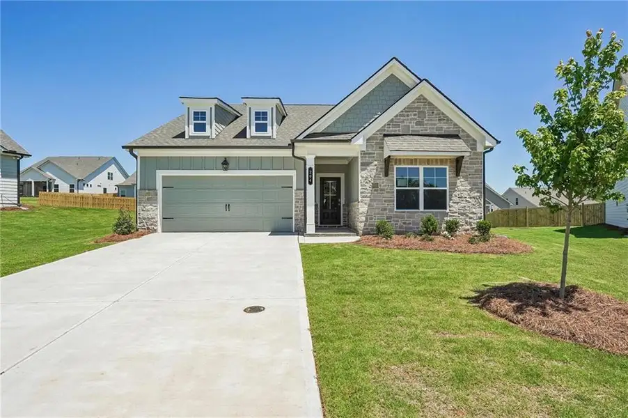 Front exterior of a new home in Garland Meadows, Cartersville, GA, highlighting curb appeal (Image 1). Front exterior of a new home in Garland Meadows, Cartersville, GA, highlighting curb appeal (Image 1).