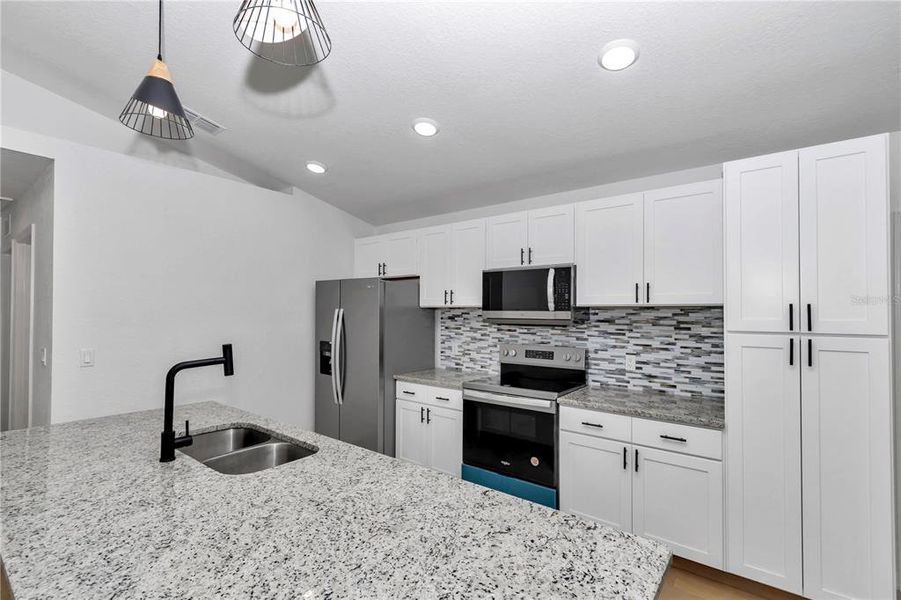 Furnished interior view inside a new home in , Dunnellon (Image 12).