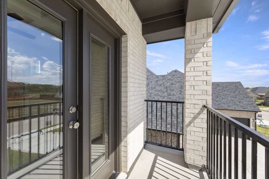 Exterior details and patio area of a home in Nelson Lake Estates, Rockwall (Image 3).