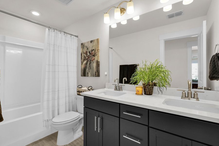 Furnished interior view inside a new home in Jasmine Point at Lakes of Cane Bay, Summerville (Image 10).