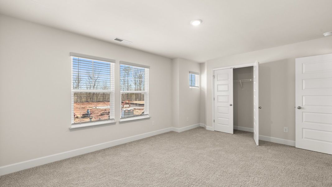 Representative unfurnished interior of a home built from the Hampshire by D.R. Horton in Heritage Pointe, Senoia (Image 34).