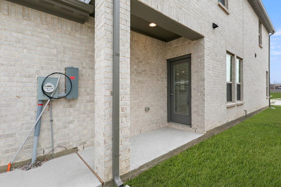 Front exterior of a new home in Sanger Circle – Townhomes, Sanger, TX, highlighting curb appeal (Image 29). Front exterior of a new home in Sanger Circle – Townhomes, Sanger, TX, highlighting curb appeal (Image 29).
