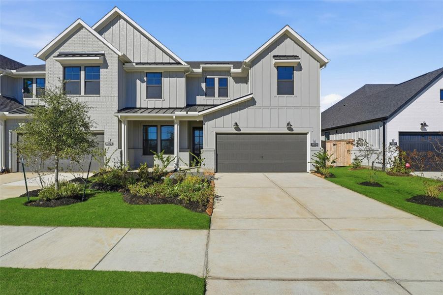 Front exterior of a new home in , Cypress, TX, highlighting curb appeal (Image 17).