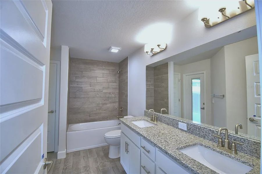 Furnished interior view inside a new home in Lake Juliana Estates, Auburndale (Image 9).