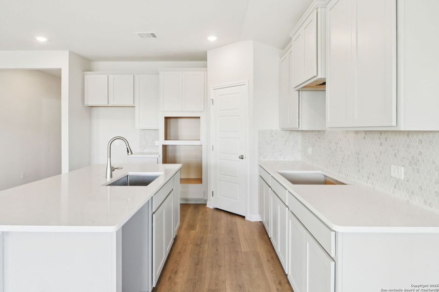 Furnished interior view inside a new home in Legendary Trails - Classic Series, Cibolo (Image 7).