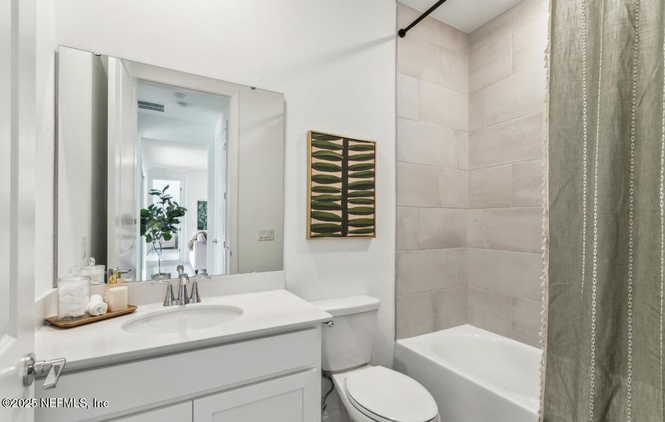 Furnished interior view inside a new home in Edenbrooke at Hyland Trail | 55+: Edenbrooke at Hyland Trail 60s, Green Cove Springs (Image 9).