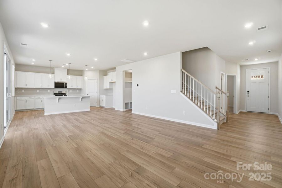 Gathering room, kitchen and foyer