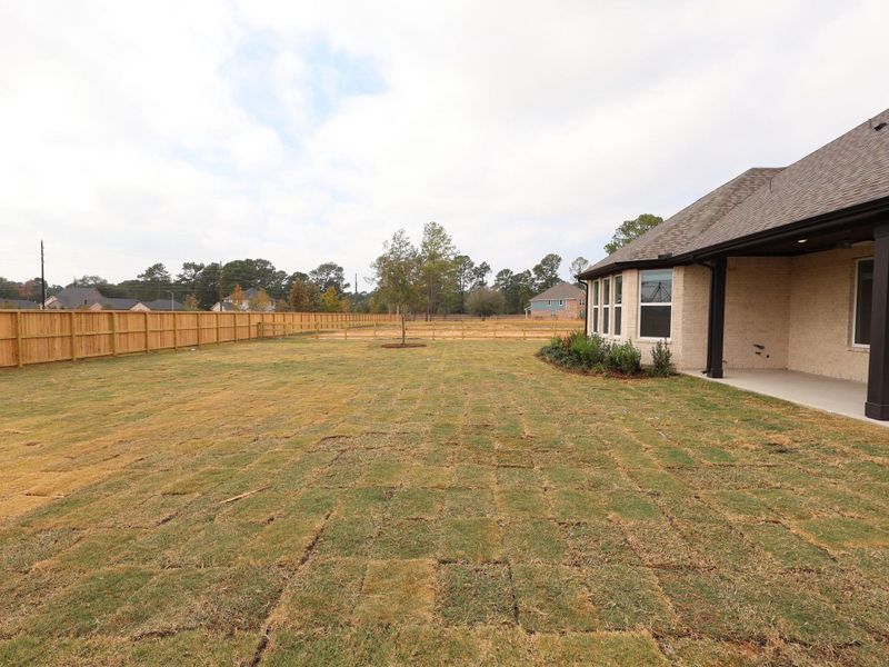 Exterior details and patio area of a home in Sorella, Tomball (Image 2). Exterior details and patio area of a home in Sorella, Tomball (Image 2).