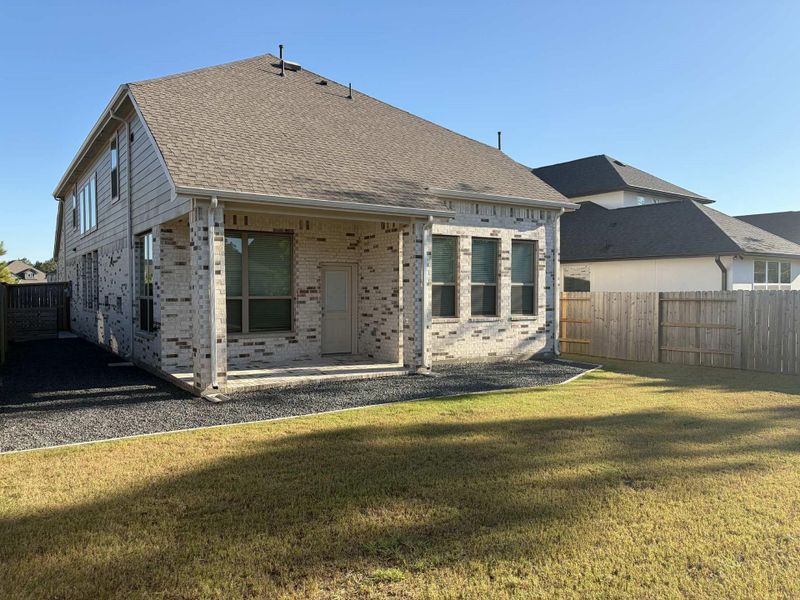 Exterior details and patio area of a home in Evergreen, Conroe (Image 4). Exterior details and patio area of a home in Evergreen, Conroe (Image 4).