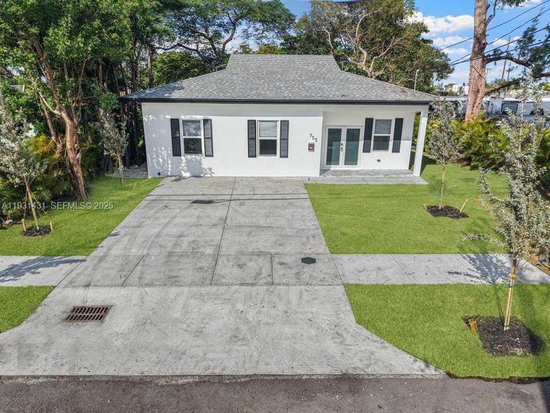 Exterior details and patio area of a home in , Miami (Image 11). Exterior details and patio area of a home in , Miami (Image 11).