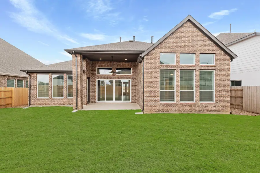Exterior details and patio area of a home in Elyson, Katy (Image 4). Exterior details and patio area of a home in Elyson, Katy (Image 4).
