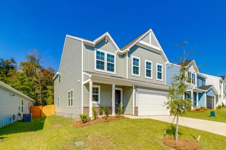 Front exterior of a new home in Killians Crossing, Blythewood, SC, highlighting curb appeal (Image 22).