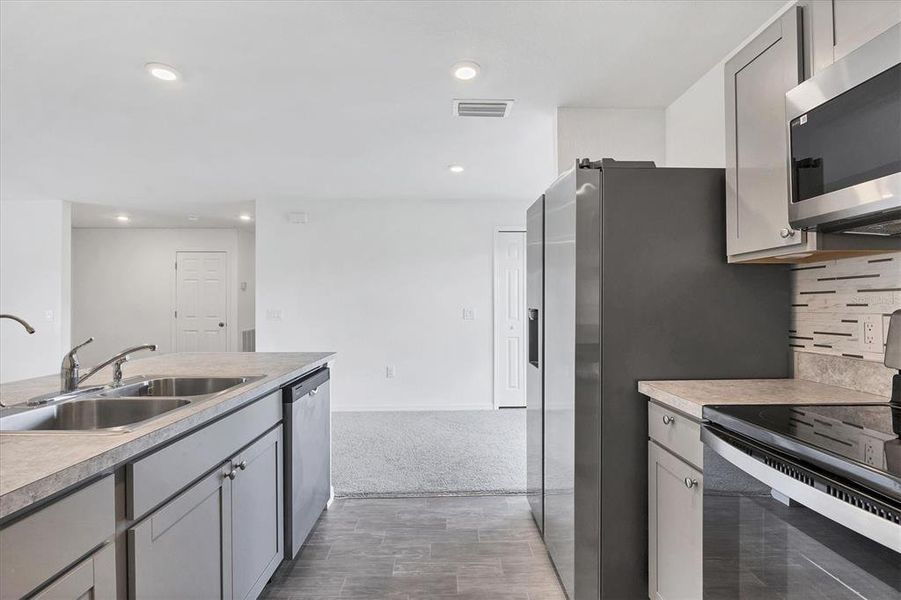 Furnished interior view inside a new home in , North Port (Image 4).
