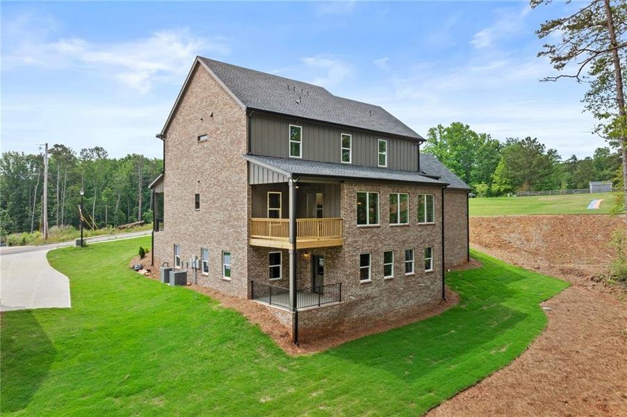 Front exterior of a new home in , Buford, GA, highlighting curb appeal (Image 25). Front exterior of a new home in , Buford, GA, highlighting curb appeal (Image 25).