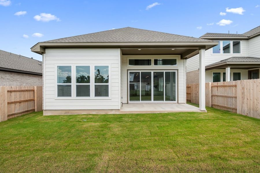 Front exterior of a new home in Terrace Collection at Lariat, Liberty Hill, TX, highlighting curb appeal (Image 29). Front exterior of a new home in Terrace Collection at Lariat, Liberty Hill, TX, highlighting curb appeal (Image 29).