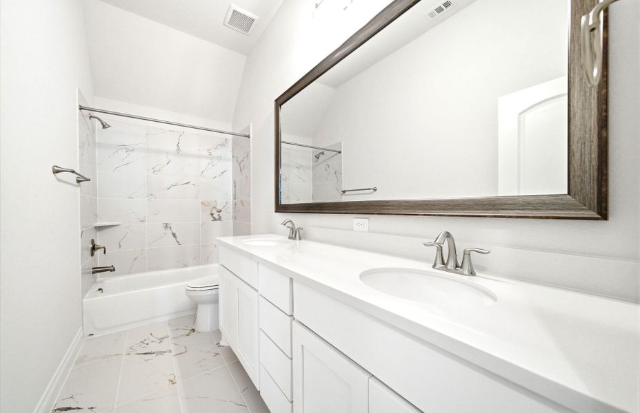 Furnished interior view inside a new home in Bridgeland 60′, Cypress (Image 19).