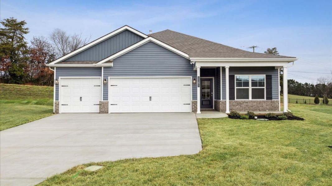 Representative exterior photo of a completed home built from the Madison by D.R. Horton in Mary's Pointe, Clinton, TN (Image 1).