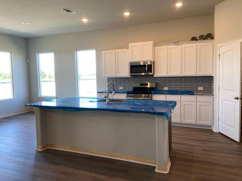 Furnished interior view inside a new home in Clear Sky Addition, Valley View (Image 5).