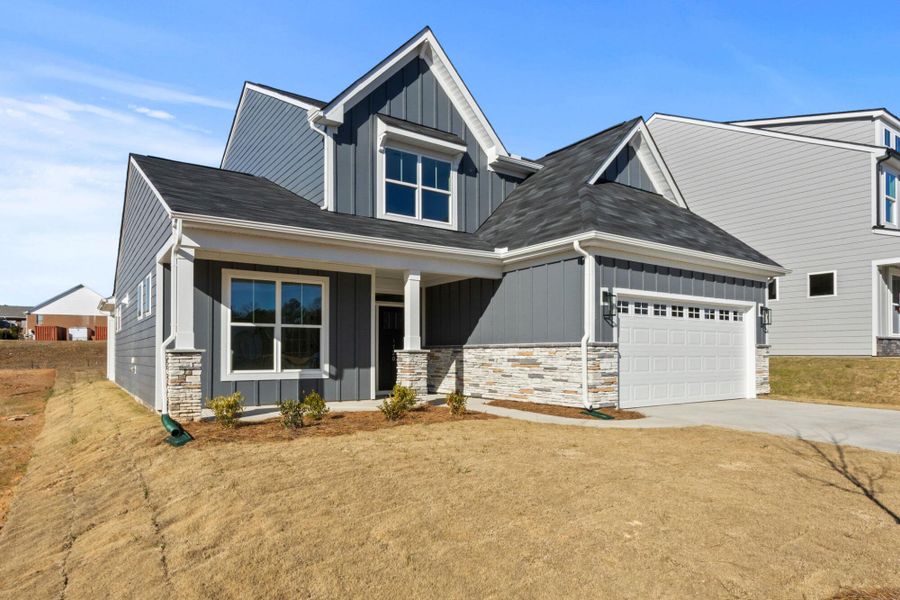 Front exterior of a new home in Founders Club, Moore, SC, highlighting curb appeal (Image 2).