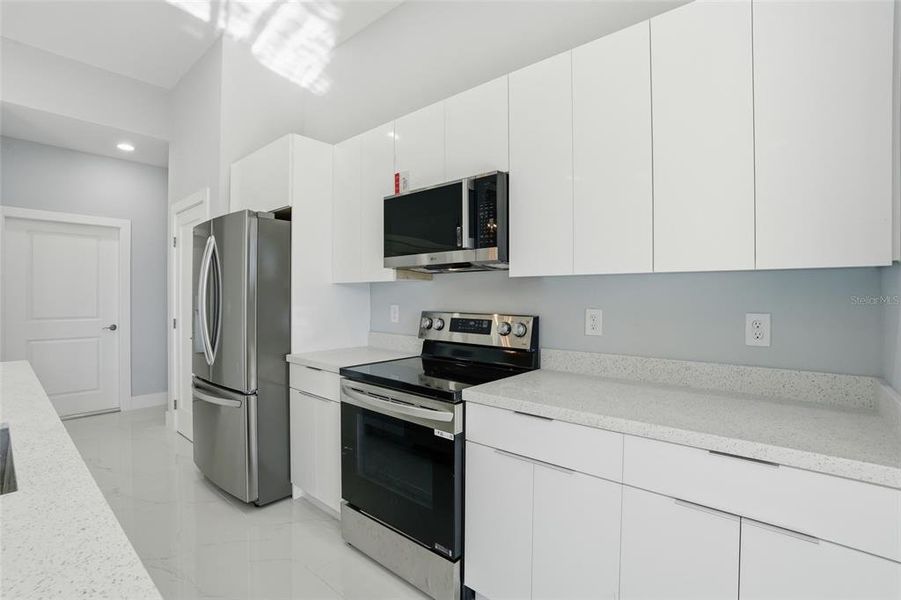 Furnished interior view inside a new home in , Lehigh Acres (Image 13).