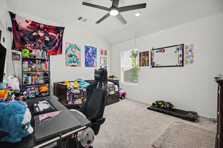 Additional bedroom offering a bright, open feel with vaulted ceilings and ample floor space. Additional bedroom offering a bright, open feel with vaulted ceilings and ample floor space.