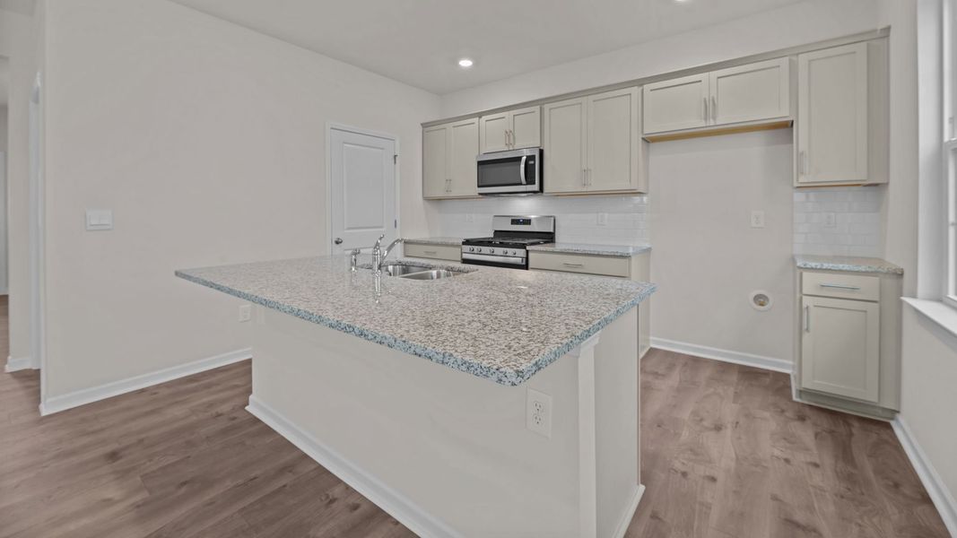 Furnished interior view inside a new home in Bedford Place, Wilson (Image 6).