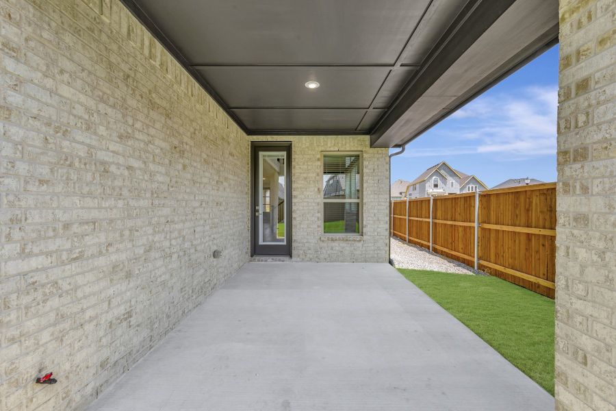 Exterior details and patio area of a home in Sandbrock Ranch, Aubrey (Image 4).