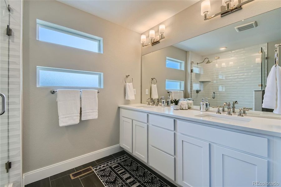 Primary Bathroom with Beautiful Finishes!-Photo of Model