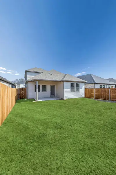 Covered Patio in the Willow home plan by Trophy Signature Homes – REPRESENTATIVE PHOTO