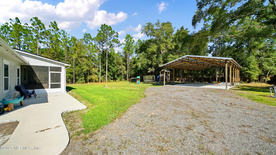 Exterior details and patio area of a home in , Keystone Heights (Image 25). Exterior details and patio area of a home in , Keystone Heights (Image 25).