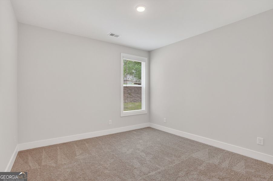Spacious, unfurnished interior of a new home in The Fairways at Mirror Lake, Villa Rica (Image 27). Spacious, unfurnished interior of a new home in The Fairways at Mirror Lake, Villa Rica (Image 27).