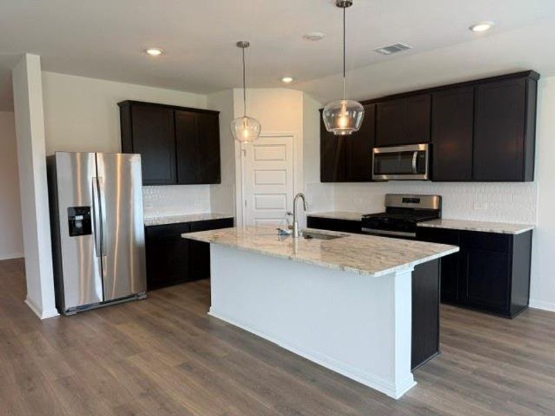 Furnished interior view inside a new home in Butler Farms - Boulevard Collection, Liberty Hill (Image 5). Furnished interior view inside a new home in Butler Farms - Boulevard Collection, Liberty Hill (Image 5).