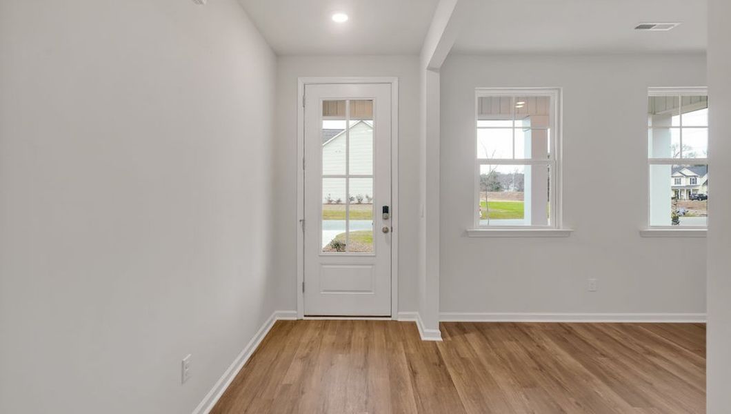 Representative unfurnished interior of a home built from the GLYNN by D.R. Horton in Grayson Park, Leland (Image 13).