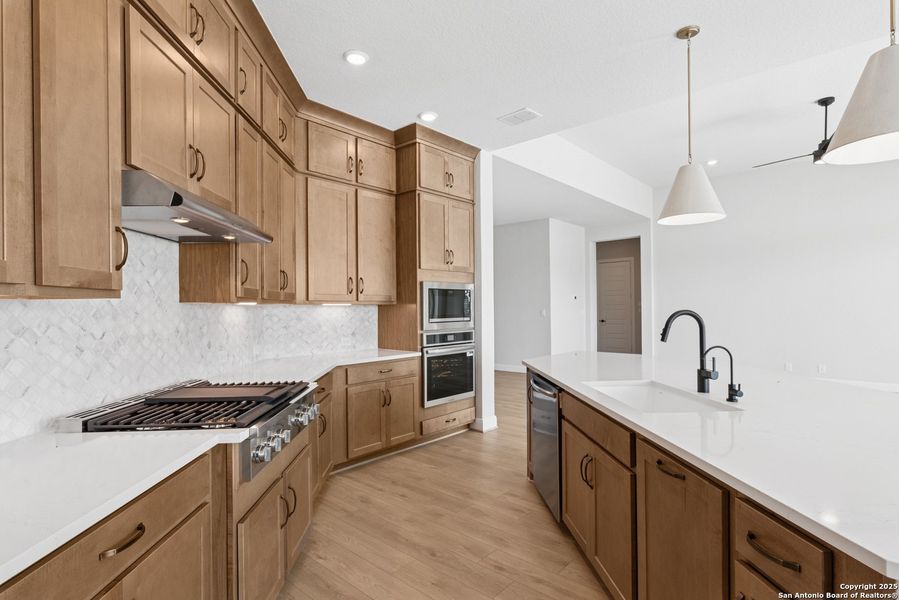 Furnished interior view inside a new home in Megans Landing – Half-Acre Homesites, Castroville (Image 5).