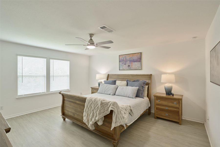 Furnished interior view inside a new home in The Pines At Seven Coves, Willis (Image 27).