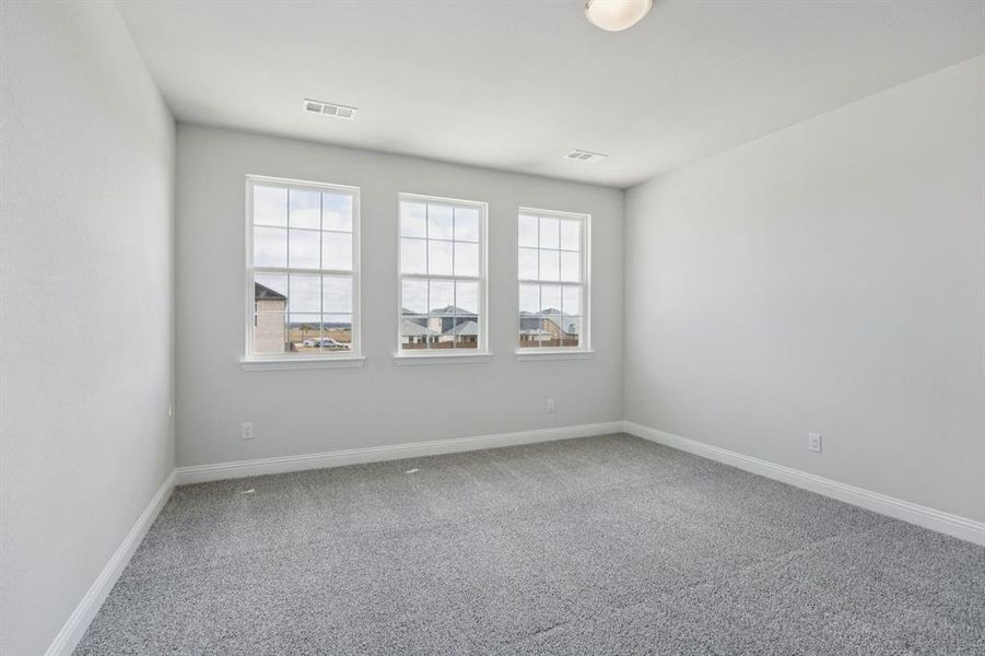 Spacious, unfurnished interior of a new home in Santorini, Seagoville (Image 13).