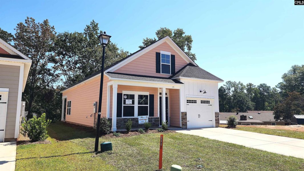 Front exterior of a new home in Bickley Station, Irmo, SC, highlighting curb appeal (Image 1). Front exterior of a new home in Bickley Station, Irmo, SC, highlighting curb appeal (Image 1).