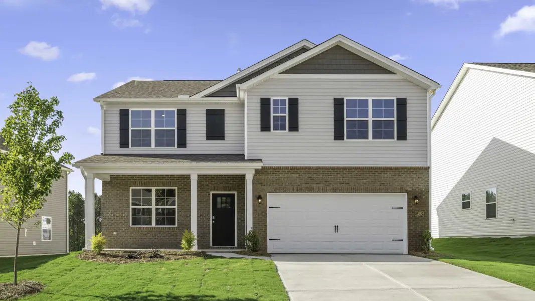 Front exterior of a new home in Colly Farm, Stokesdale, NC, highlighting curb appeal (Image 1). Front exterior of a new home in Colly Farm, Stokesdale, NC, highlighting curb appeal (Image 1).