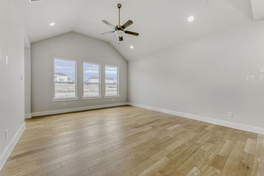 Empty room with recessed lighting, light wood finished floors, and a ceiling fan